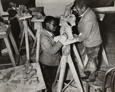 Boys sculpting a horse, Harlem Community Art Center, 1937.