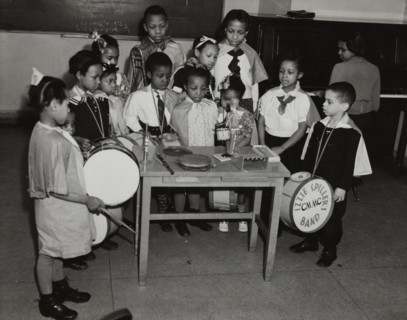 Drum students around a table, 1938.