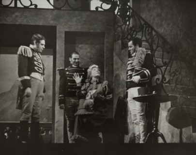 Woman talking to three men, 1938.