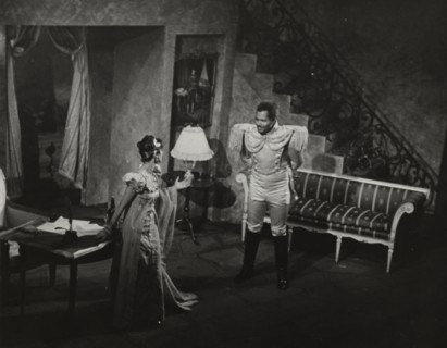 Woman in evening dress and Rex Ingram, 1938.