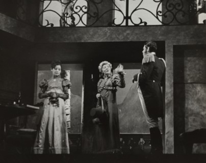 Two woman and a man, standing, 1938.