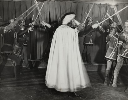 Soldiers with swords raised, 1936.