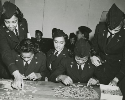 Two African American Lieutenants of the Women's Army Corps sitting at a table and..., 1939 - 1945. Creator: Unknown.