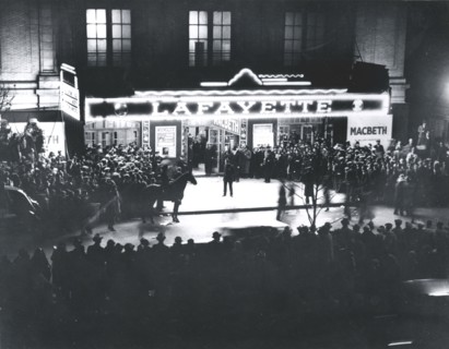 Crowd outside the Lafayette Theatre, in Harlem, at the opening of "Macbeth" produced..., 1936. Creator: Federal Theatre Project.