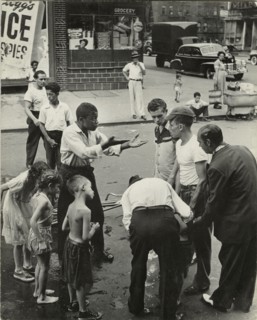 Eastside - Group of men and youths gathered around an accident victim; one young..., 1947 - 1951. Creator: Romulo Lachatanere.