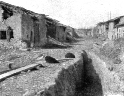 'Aspects du champ de bataille de Verdun; route traversant le village dispute de Cumieres..., 1916. Creator: Unknown.