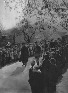 'Printemps d'Alsace; les ecoliers d'un village ranges sur le passage du President de la.... ', 1916. Creator: Unknown.