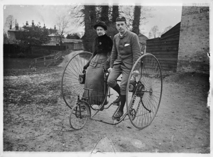 Man and a woman sitting on a double tricycle, England, c1890. Creator: Unknown.