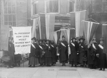 Woman Suffrage - Group Leaving Headquarters, 1917. Creator: Harris & Ewing.