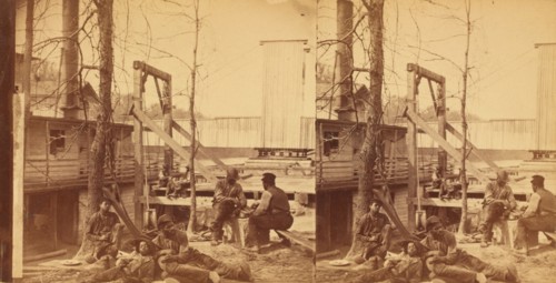 North Carolina. Negro boatmen at lunch, c1850-c1930. Creator: Rufus Morgan.