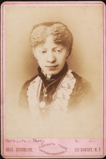 Miss Perry, colored albina, Barnum Show, c1880-c1889. Creator: Charles Eisenmann.
