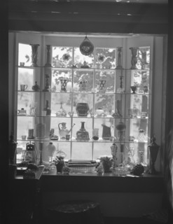 DeLamar, Alice, Miss, house window display, between 1927 and 1942. Creator: Arnold Genthe.