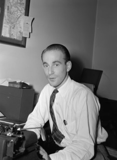 Portrait of Mike Levin, Down Beat office, New York, N.Y., ca. 1947. Creator: William Paul Gottlieb.