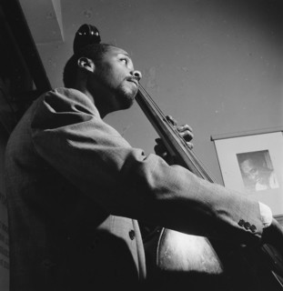Portrait of Slam Stewart, William P. Gottlieb's office, New York, N.Y., 1946. Creator: William Paul Gottlieb.