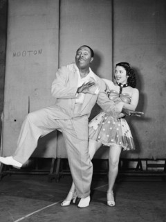 Portrait of Louis Jordan, Paramount Theater(?), New York, N.Y., ca. July 1946. Creator: William Paul Gottlieb.