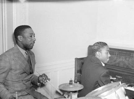 Portrait of Tommy Myles and John Malachi, Turkish Embassy, Washington, D.C., 1938. Creator: William Paul Gottlieb.