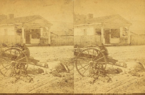 Uncle Bob at parade [rest?], [Man and children resting around an oxcart, in town], (1868-1900?). Creator: Unknown.