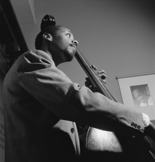 Portrait of John Simmons, William P. Gottlieb's office, New York, N.Y., ca. July 1947. Creator: William Paul Gottlieb.