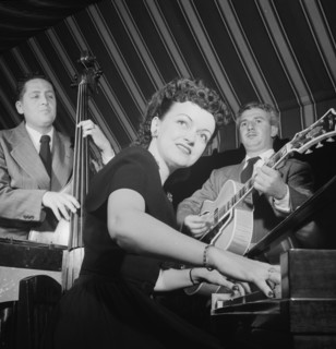 Portrait of Dardanelle and Joe Sinacore, Hickory House, New York, N.Y., ca. July 1947. Creator: William Paul Gottlieb.
