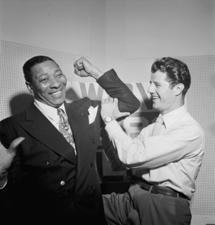 Portrait of Sid Catlett and Freddie Robbins, WOV office, New York, N.Y., ca. June 1947. Creator: William Paul Gottlieb.