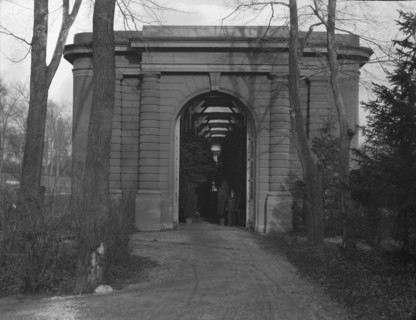 Entrance to the orangery of the gardens at Kijkuit, John D. Rockefeller's estate..., c1916-1918. Creator: Arnold Genthe.
