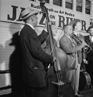 Portrait of Albert Nicholas and Rudi Blesh, Riverboat on the Hudson, N.Y., ca. July 1947. Creator: William Paul Gottlieb.