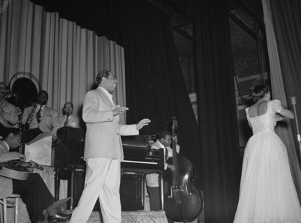 Portrait of Duke Ellington, Barney Bigard, Ben..., Howard Theater(?), Washington, D.C., 1938. Creator: William Paul Gottlieb.