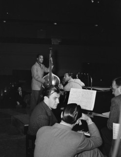 Portrait of Eddy Duchin, Wesley Prince, Nat King Cole, and Oscar Moore, New York, ca. July 1946. Creator: William Paul Gottlieb.