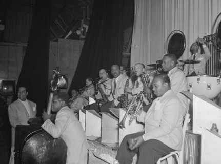 Portrait of Duke Ellington, Junior Raglin, Tricky..., Howard Theater(?), Washington, D.C., 1938. Creator: William Paul Gottlieb.