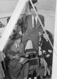 Portrait of Cliff Edwards, Betty Brewer, and Frank...Ukelele Lady (yacht), Hudson River, N.Y., 1947. Creator: William Paul Gottlieb.