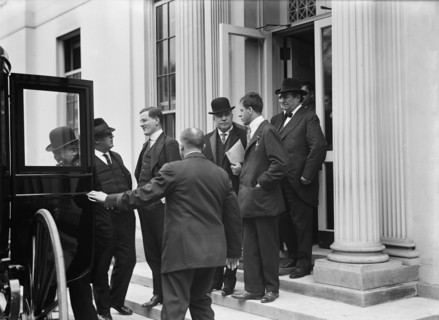 Franklin K. Lane, With Paper in Hand, in Crowd of Newsmen, 1914. Creator: Harris & Ewing.