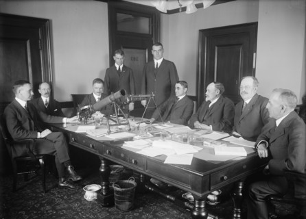 Machine Gun Board of War Department - Tracy Dixon, Brig. Gen. Todd, Newton D. Baker..., 1917. Creator: Harris & Ewing.