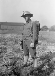 Leonard D.Mahon with Steel Helmet He Invented That Could Be Used As Shovel, 1917. Creator: Harris & Ewing.