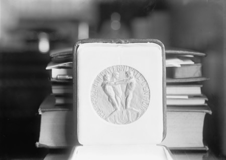 Nobel Peace Prize - The Medal, 1913. Creator: Harris & Ewing.