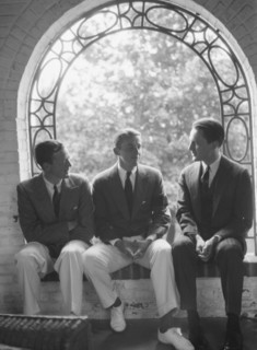 Brady, Mosely, and Scott group, seated in a window, 1930 May 24. Creator: Arnold Genthe.