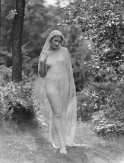 Egger, Gabrielle, Miss, standing outdoors, between 1926 and 1930. Creator: Arnold Genthe.