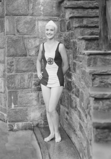 Ford, Elsie, Miss, standing outdoors in a bathing suit, 1932 July. Creator: Arnold Genthe.