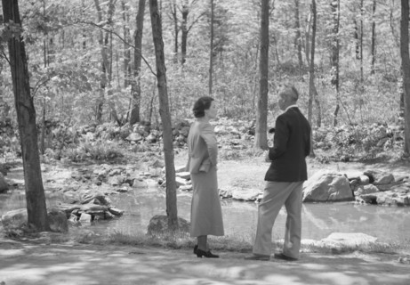 Rothbart, Albert, Mr., group, standing outdoors, between 1920 and 1935. Creator: Arnold Genthe.