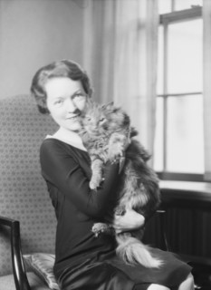 Schermerhorn, N.E., Mrs., with cat, portrait photograph, 1928 Dec. 3. Creator: Arnold Genthe.