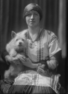 Harriman, Mrs., with dog, portrait photograph, 1913 July 7. Creator: Arnold Genthe.