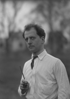 Kennerley, Mitchell, Mr., standing outdoors, 1914 or 1915. Creator: Arnold Genthe.