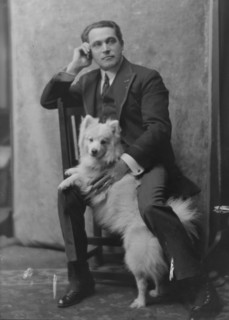 Spirescu, Steraskon, Mr., with dog, portrait photograph, 1917 Mar. 1. Creator: Arnold Genthe.
