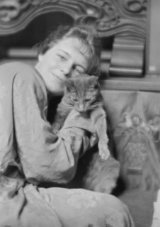 Cutler, Miss, with Buzzer the cat, portrait photograph, 1915 May 26. Creator: Arnold Genthe.
