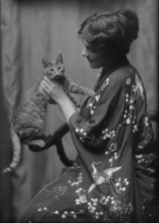 Warren, Gertrude, Miss, or Miss Jackman, with Buzzer the cat, portrait photograph, 1912 or 1913. Creator: Arnold Genthe.