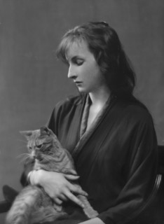 Whittaker, Miss, with Buzzer the cat, portrait photograph, 1916. Creator: Arnold Genthe.
