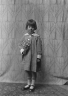 Dana, A., Mrs., child of, portrait photograph, 1915. Creator: Arnold Genthe.