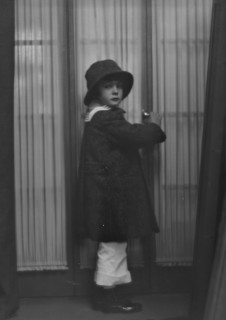 Shaw, Russell, Master, or Master Russell Thaw, portrait photograph, 1916. Creator: Arnold Genthe.