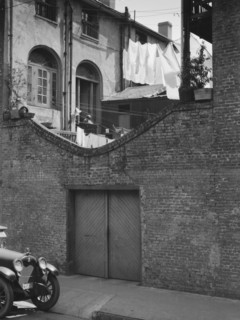 Courtyard with a garage, New Orleans, between 1920 and 1926. Creator: Arnold Genthe.