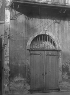 Absinthe House entrance, New Orleans, between 1920 and 1926. Creator: Arnold Genthe.