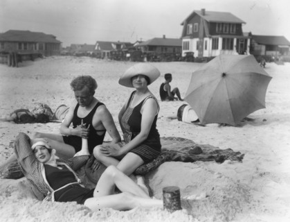 Arnold Genthe with two women friends in Long Beach, New York, between 1911 and 1942. Creator: Arnold Genthe.